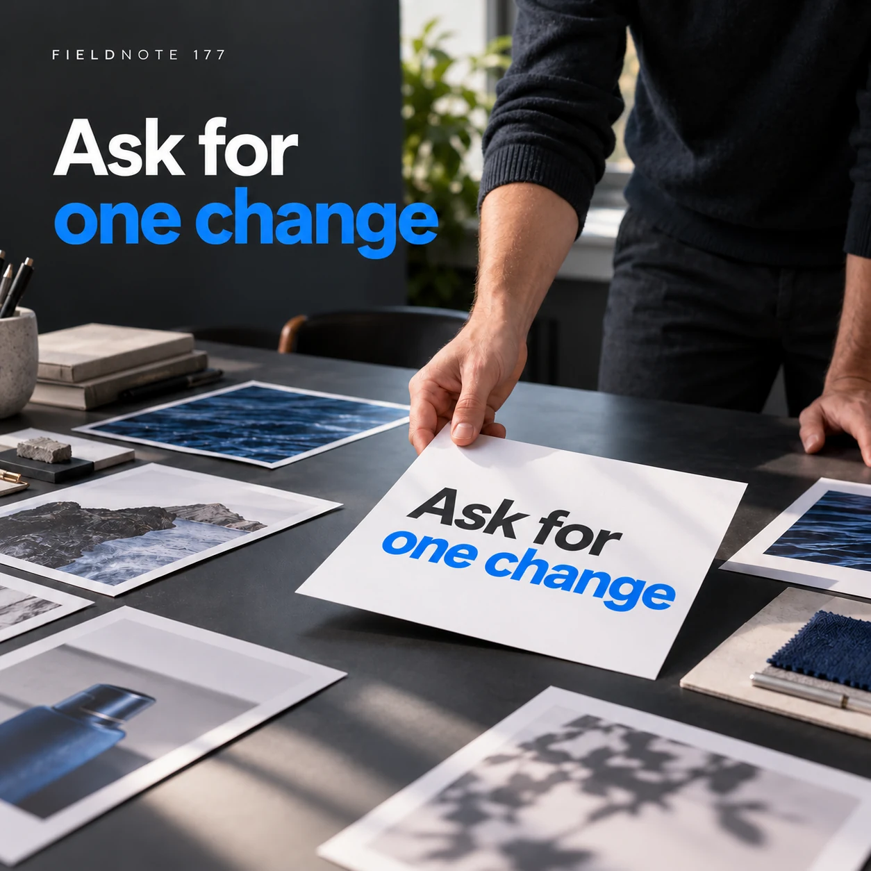 Illustrative campaign concept: adult designer moving a headline card into open space, with the headline “Ask for one change” and fictional FIELDNOTE branding.